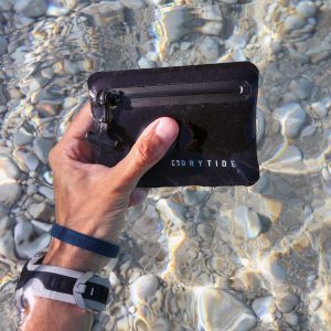 Holding DryTide waterproof wallet underwater.