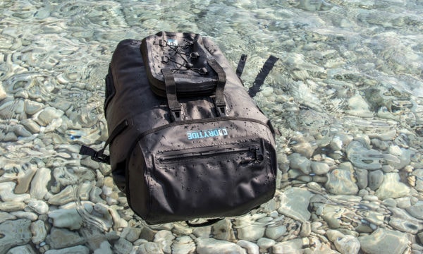 waterproof backpack floating on water